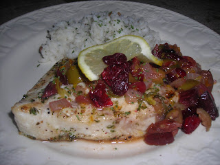 Spanish Style Peppercorn and Herb Encrusted Pan Fried Swordfish Steaks with Spicy Cranberry Olive Relish